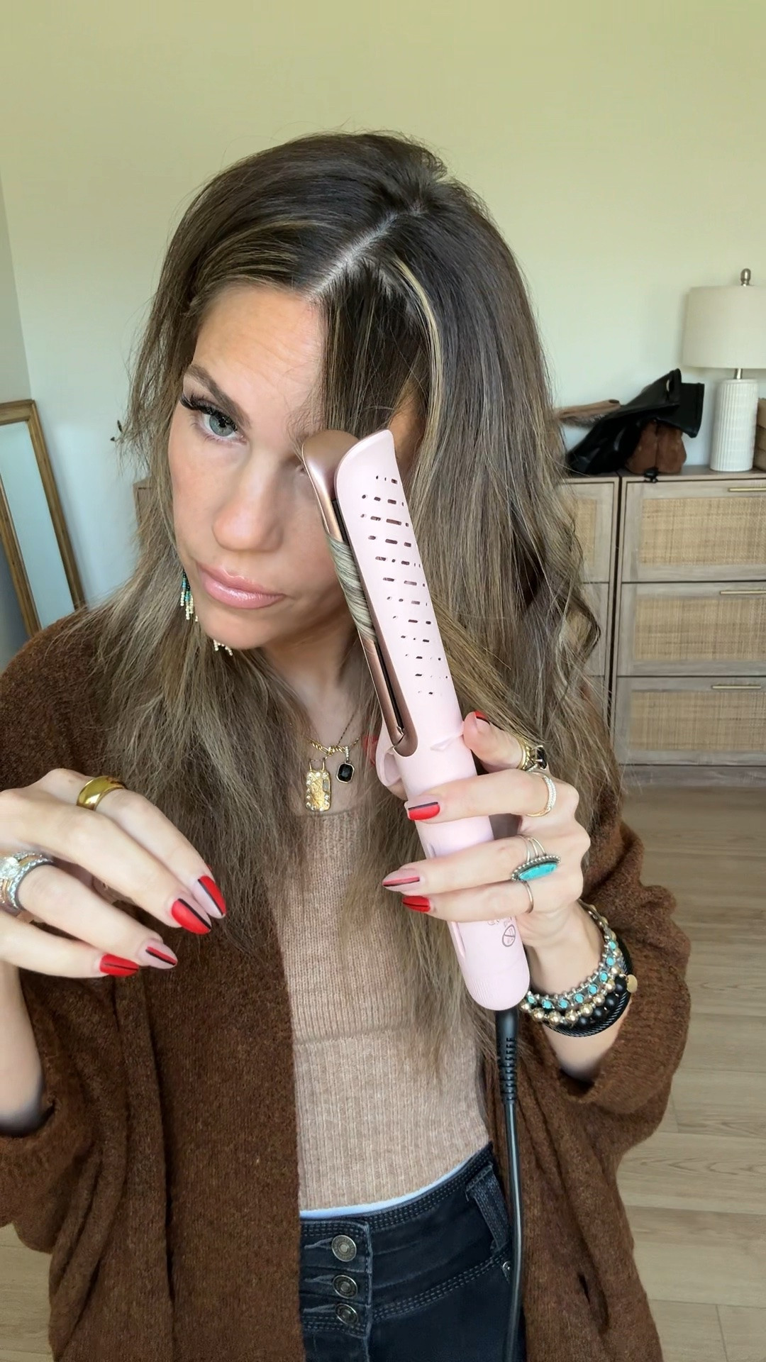 One of the hair tools you always buy most after I share it! This Wavytalk airflow styler is a 2-in-1 curling and straightening tool, and the cooling airflow helps set the finished style as you go! #WavyTalk #Hairstyler #HairTools ￼