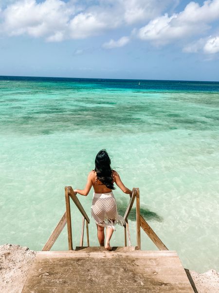 My favorite swim coverup is back in stock just in time for Spring break! It’s a must have and also comes in black!  #swimcoverup #crochetskirt #swimstyle #resortstyle 

#LTKtravel #LTKswim