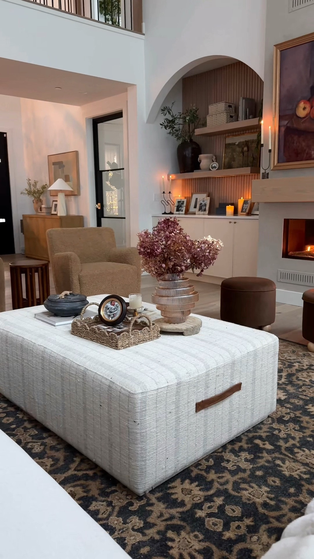 Reminder: a home takes time to create.
It took me almost 2 years to make our living room finally feel like ours.

‼️ Before you request links, you have to be following me because of IG privacy settings.

Comment LIVING to shop all of my living room decor and furniture.

Favorite things we’ve done to this space:
• Lime washed the fireplace
• Framed TV with a gold frame
• Large 6’ mirror
• Shady Lady tree + planter
• Rug that’s hardy and toddler-proof
• $15 curtain panels for the arch
• Oak fireplace mantel
• 20ft ceilings
• Cool-touch fireplace with no screens
• Automatic Amazon blinds that saved us thousands
• Oak wood floors