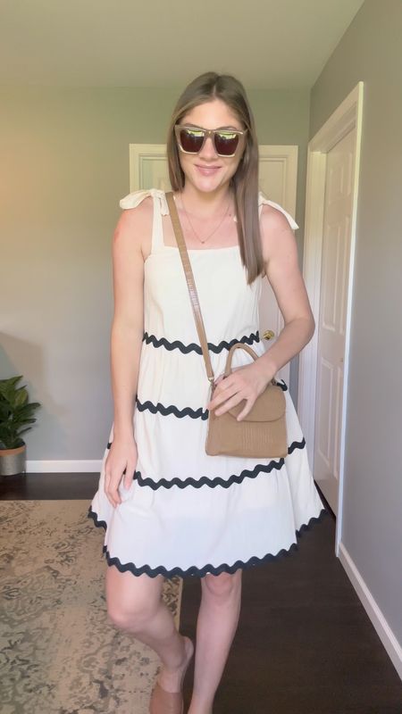 Comment “SUNDRESS” to shop. This is the perfect little summer sundress. It’s lightweight with adjustable straps. Comes in other colors and is on sale today for less than $35. It runs true to size & size double lined. 

#LTKfindsunder50 #LTKsalealert #LTKstyletip