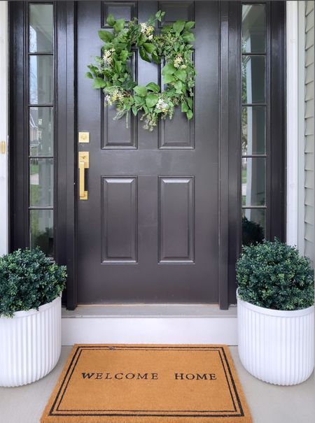$25 Walmart planters are currently back in stock! I paired them with these faux boxwoods from Amazon for a classic front porch look. 

#LTKunder50 #LTKhome #LTKSeasonal