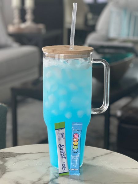 This glass tumbler is totally swoon-worthy and holds 40 oz of liquid. I used a Skittles Tropical punch packet and a Sunkist lemon lime packet in this pretty ocean blue water recipe today. 

#LTKover40 #LTKFind #LTKBacktoSchool