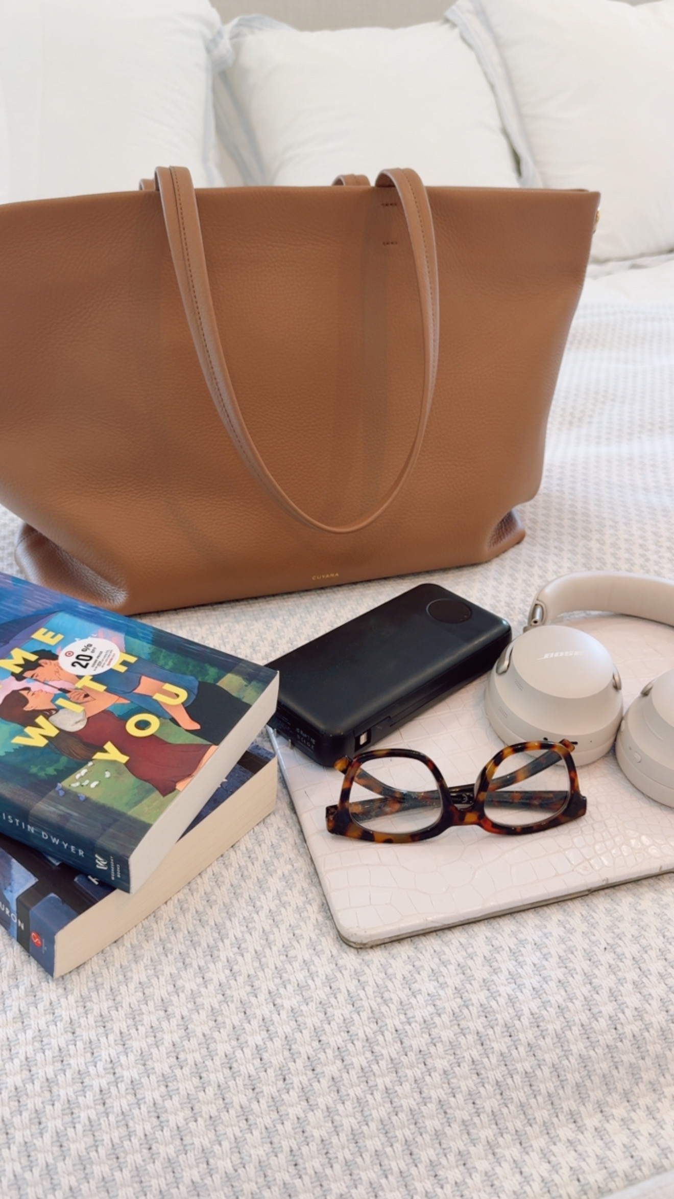 @cuyana #ad My go to travel bag for personal items. It fits everything I need for a flight while still looking polished, and it’s one of those bags I reach for every time I travel. 🤎 

 #LTKmomlife #LTKSeasonal #LTKTravel