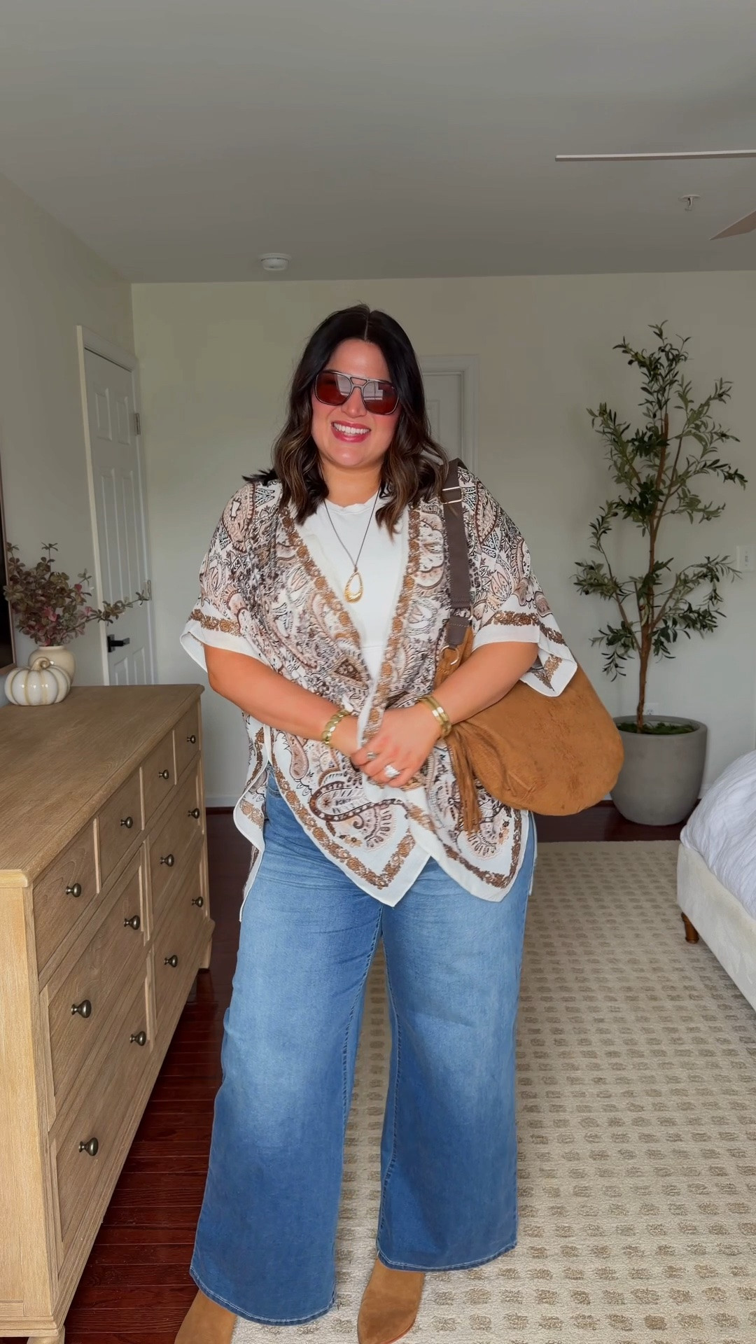 Midsize fall outfit idea! I cannot believe yesterday was the first day of fall 🍁 I could not be more excited but it just feels like this month is flying by 😩 I shared this outfit the other week in a haul + you have been loving it! So I wanted to share a full styling with some accessories 💖

White tee - xl
Jeans - 16
Kimono - one size 
Boots are older from dolce vita, added this years version!

#LTKootd #LTKSeasonal #LTKMidsize
