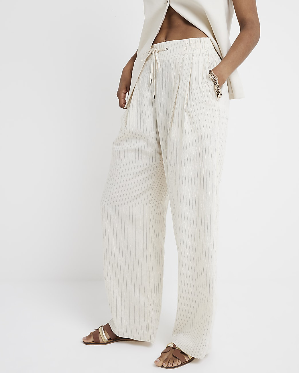 Cream wide leg stripe trousers | River Island UK & IE