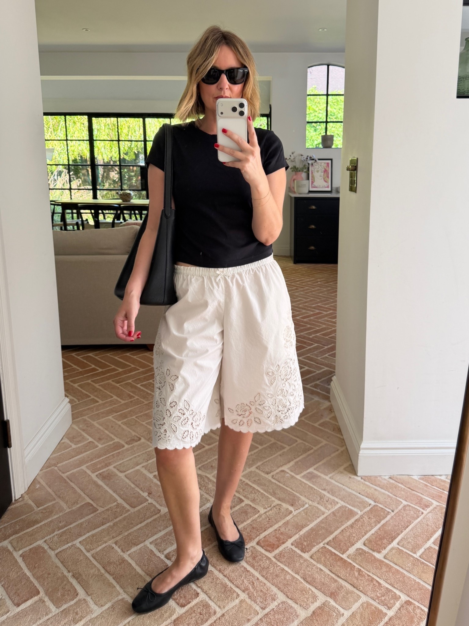 Loving Bermuda shorts 🤍

black crop tee, black fitted t-shirt, eyelet lace shorts, embroidered bermuda shorts, white eyelet shorts, knee length shorts, drawstring waist shorts, black slouchy shoulder bag, black hobo bag, black ballet flats, bow ballet flats, black sunglasses, casual weekend outfit, elevated basics, effortless summer style, mixed textures neutral, quiet luxury, minimalist off duty look, ltkstyletip, ltkseasonal, ltksummer, ltkfindsunder100, outfit inspo, capsule wardrobe essentials

#LTKeurope #LTKsummer #LTKstyletip