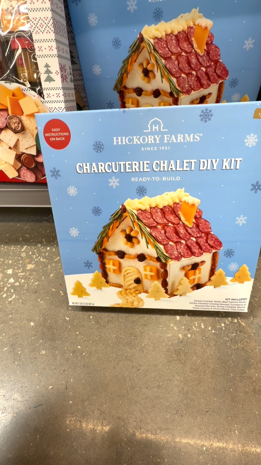 Hickory Farms Charcuterie Chalet DIY Kit | Charcuterie Board Kit Gift Box

This make-it-yourself charcuterie board kit is a savory twist on a classic holiday gingerbread house! Everything you need to build your chalet is included in this gift box: Savory Cracker Walls, White Cheddar Cheese Spread, Beef Salami Slices, Three Cheese & Onion Blend, Sharp Cheddar Blend, Cranberry & Sesame Nut Mix, and Tree Cutter. It's a fun activity to enjoy with family or friends, and makes an impressive holiday centerpiece

#LTKHome #LTKHoliday #LTKfoodie