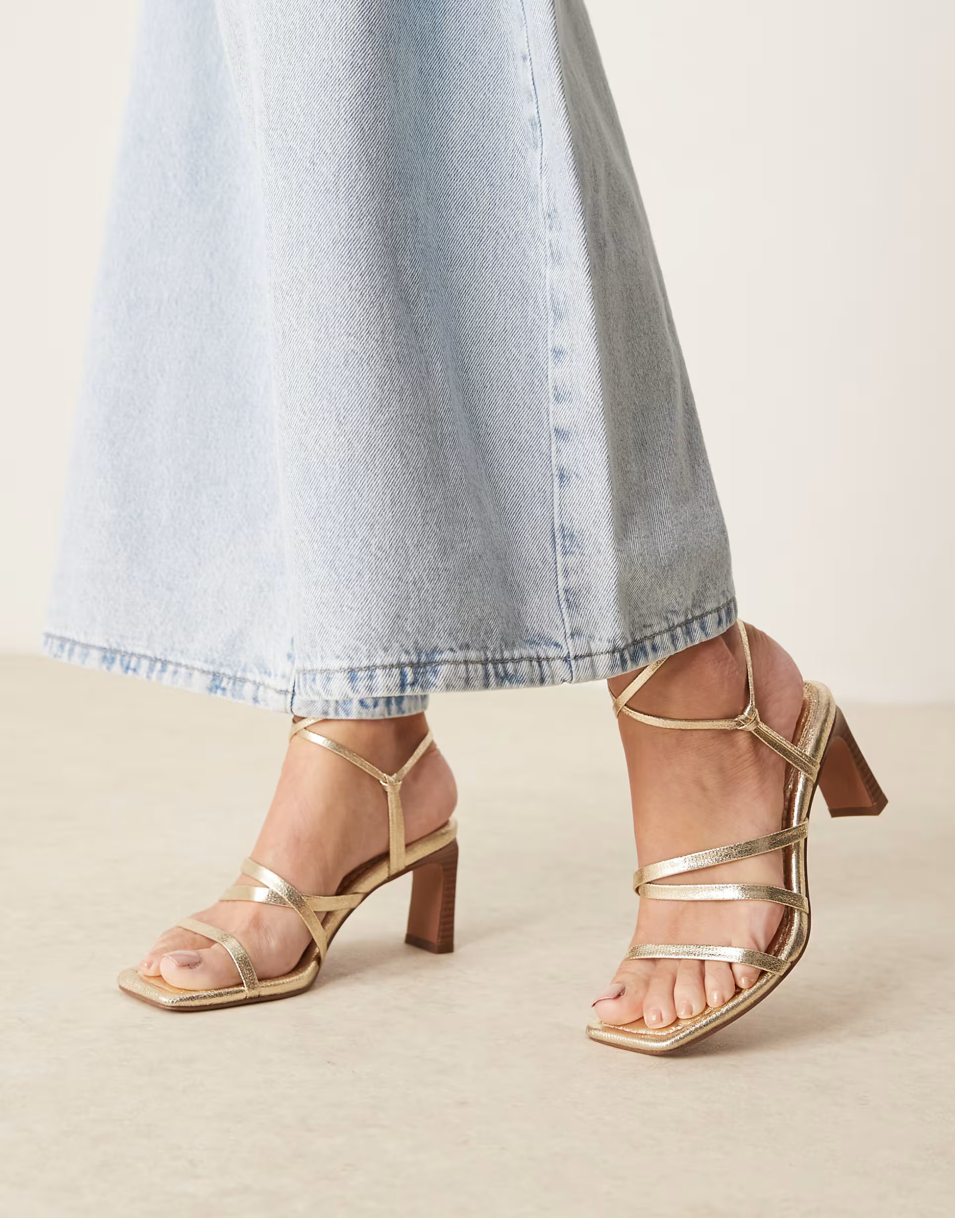 ASOS DESIGN Hideaway strappy tie leg mid block heeled sandals in gold | ASOS | ASOS (Global)