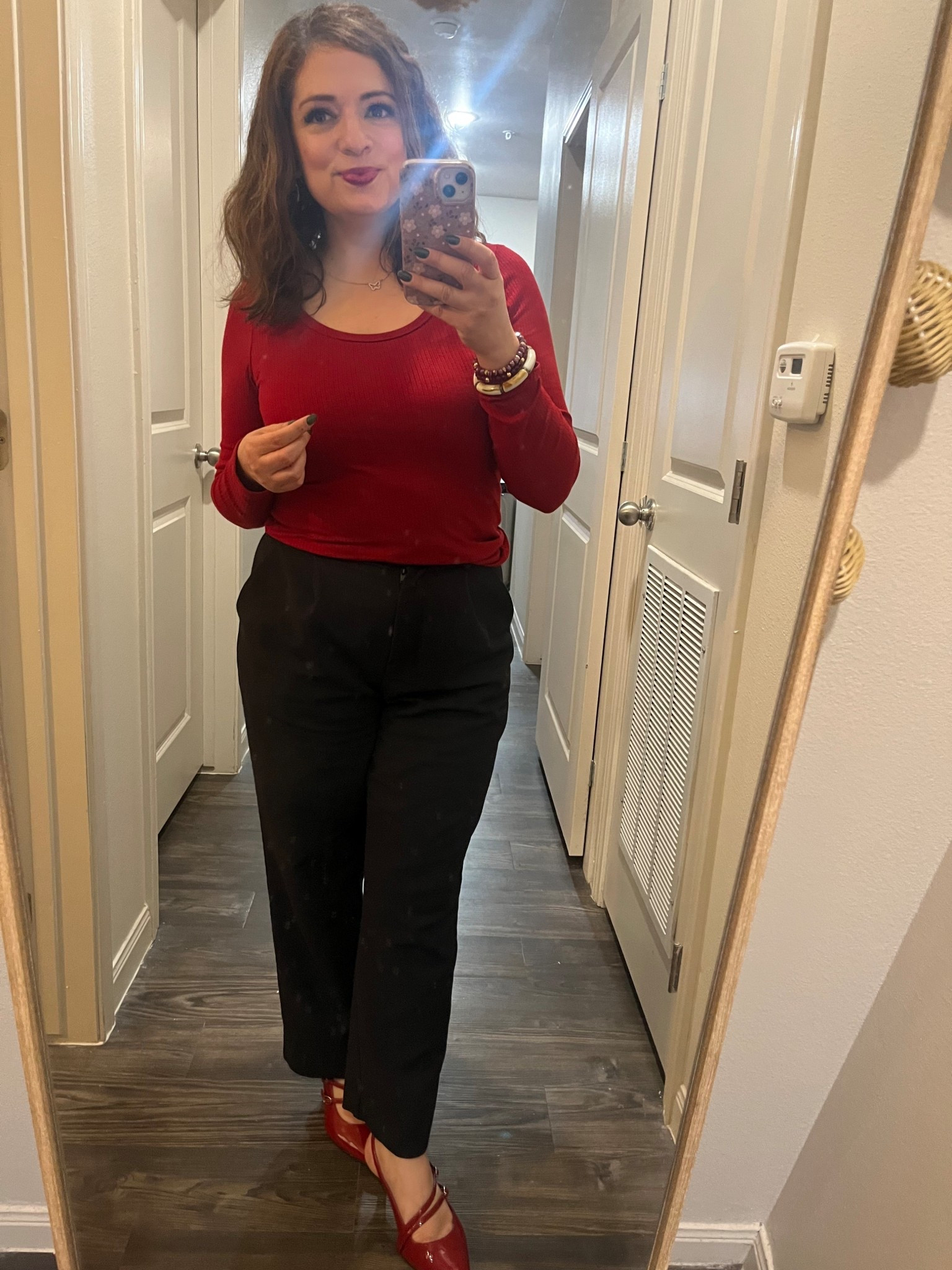 Simple chic holiday look 
Red heels 
Black pants 
Red top 
Linking up similar styles 



#LTKHoliday