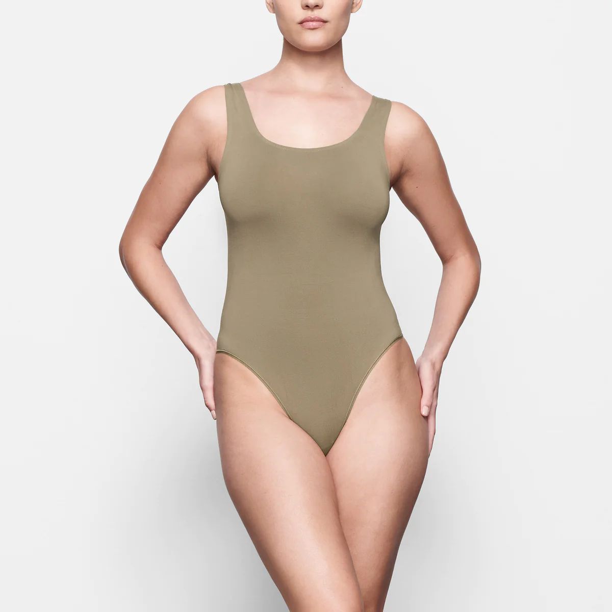 SOFT SMOOTHING THONG BODYSUIT | SKIMS (US)