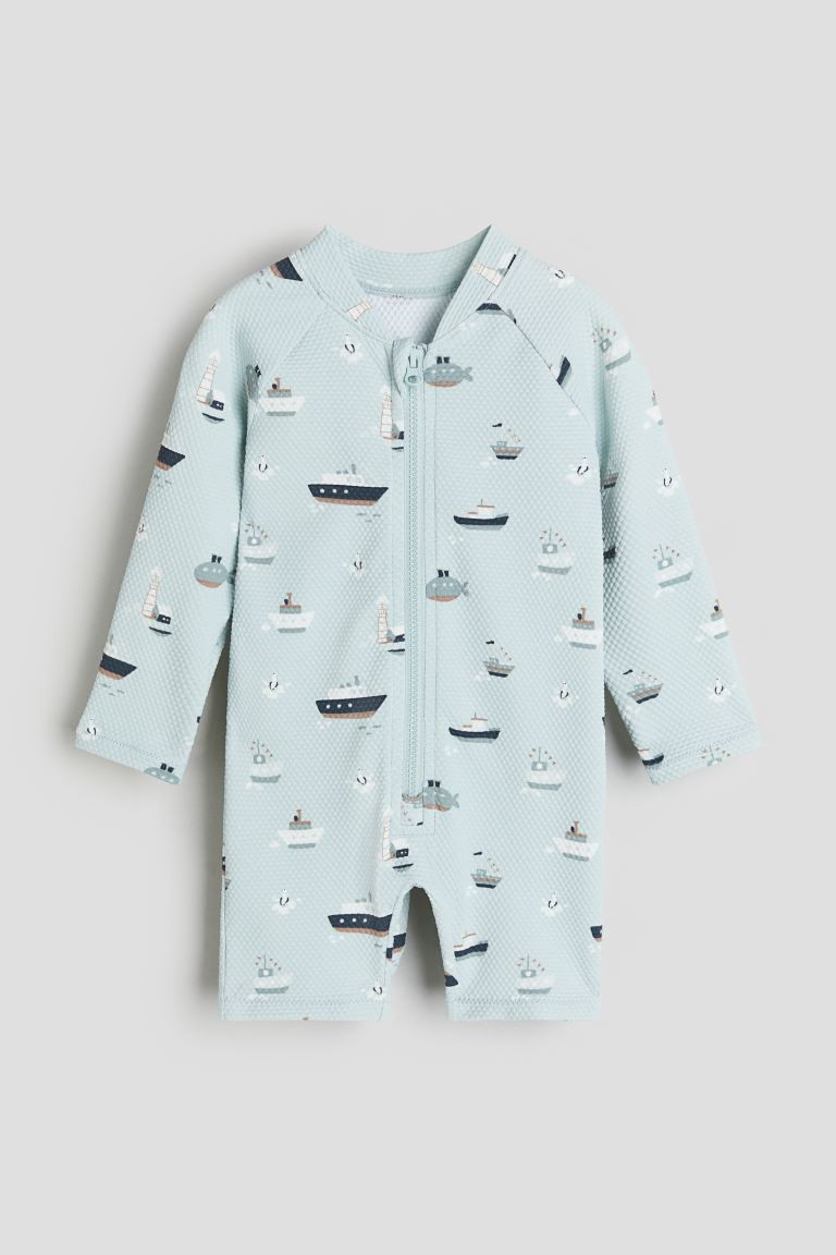 Swimsuit UPF 50 - Long sleeve - Light turquoise/patterned - Kids | H&M US | H&M (US + CA)