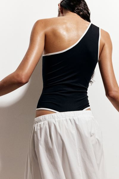 Body string asymétrique - Encolure asymétrique - Sans manches - Noir - FEMME | H&M FR | H&M (FR, IT, ES, PT, BE)
