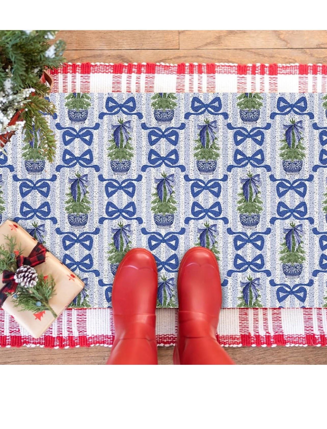 Blue Chinoiserie Bow Christmas Doormat 💙🎄

This preppy blue chinoiserie Christmas doormat is such a cute way to bring holiday charm to your front porch or entryway! The repeating pattern of mini Christmas trees in blue ginger-jar pots paired with sweet ribbon bows gives the perfect grand-millennial Christmas look. I love it layered over a festive red plaid rug for that extra pop of color and texture. A fun, cheerful, and stylish way to welcome guests all season long! ❄️✨

chinoiserie Christmas • blue Christmas decor • preppy holiday home • Christmas doormat • porch styling ideas • outdoor Christmas decorations • blue & white holiday • grandmillennial Christmas • festive entryway • Amazon holiday finds • seasonal home decor 🎁💙

#LTKHome #LTKFindsUnder50 #LTKHoliday