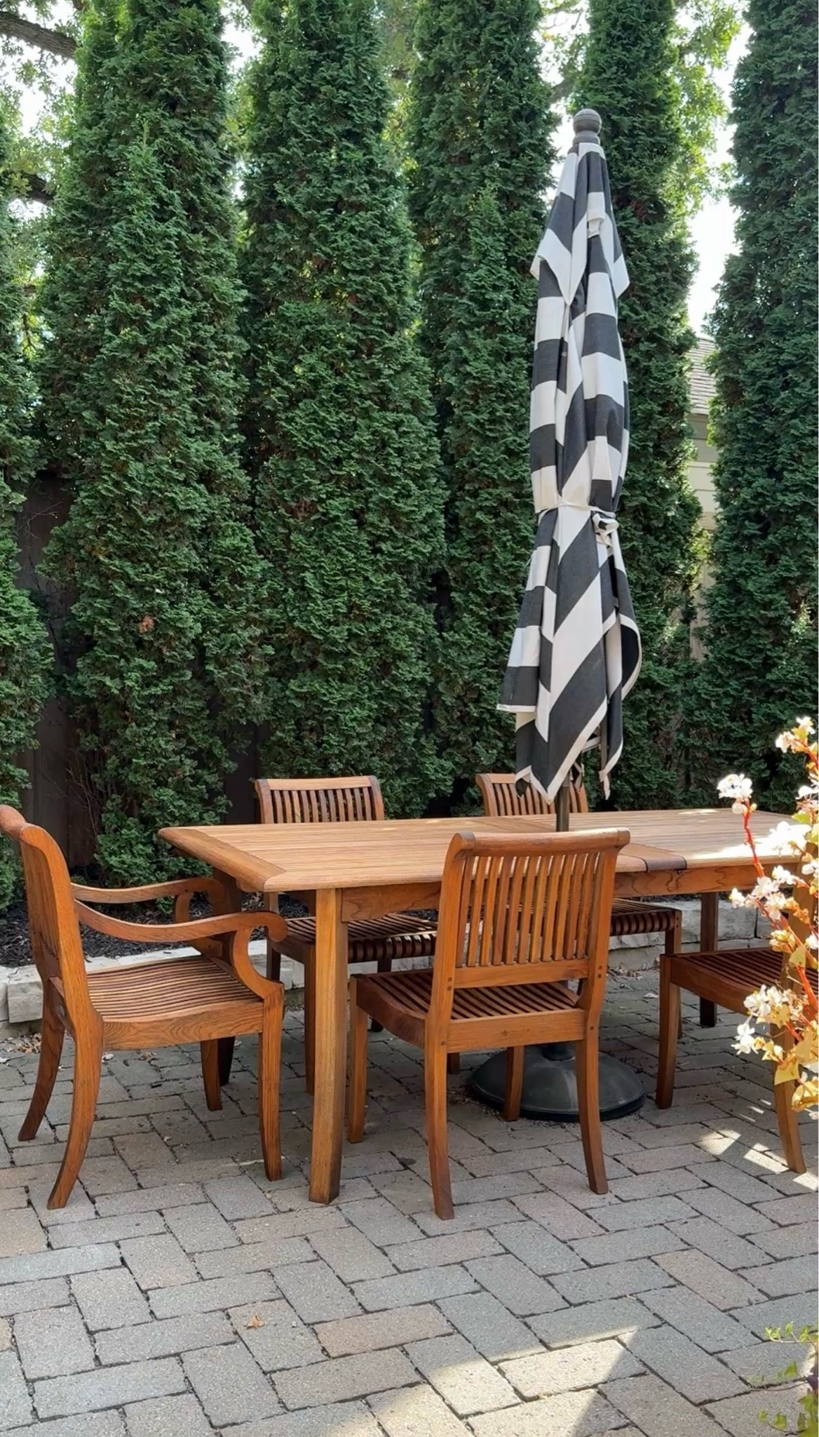 Our outdoor dining set is no longer available but I found very similar styles — even tables with the two leaves. Teak is very durable for outdoors and is always a classic in my book. Even treated properly, it will last for years to come. #outdoordecor #patiodesign #outdoorfurniture

#LTKHome