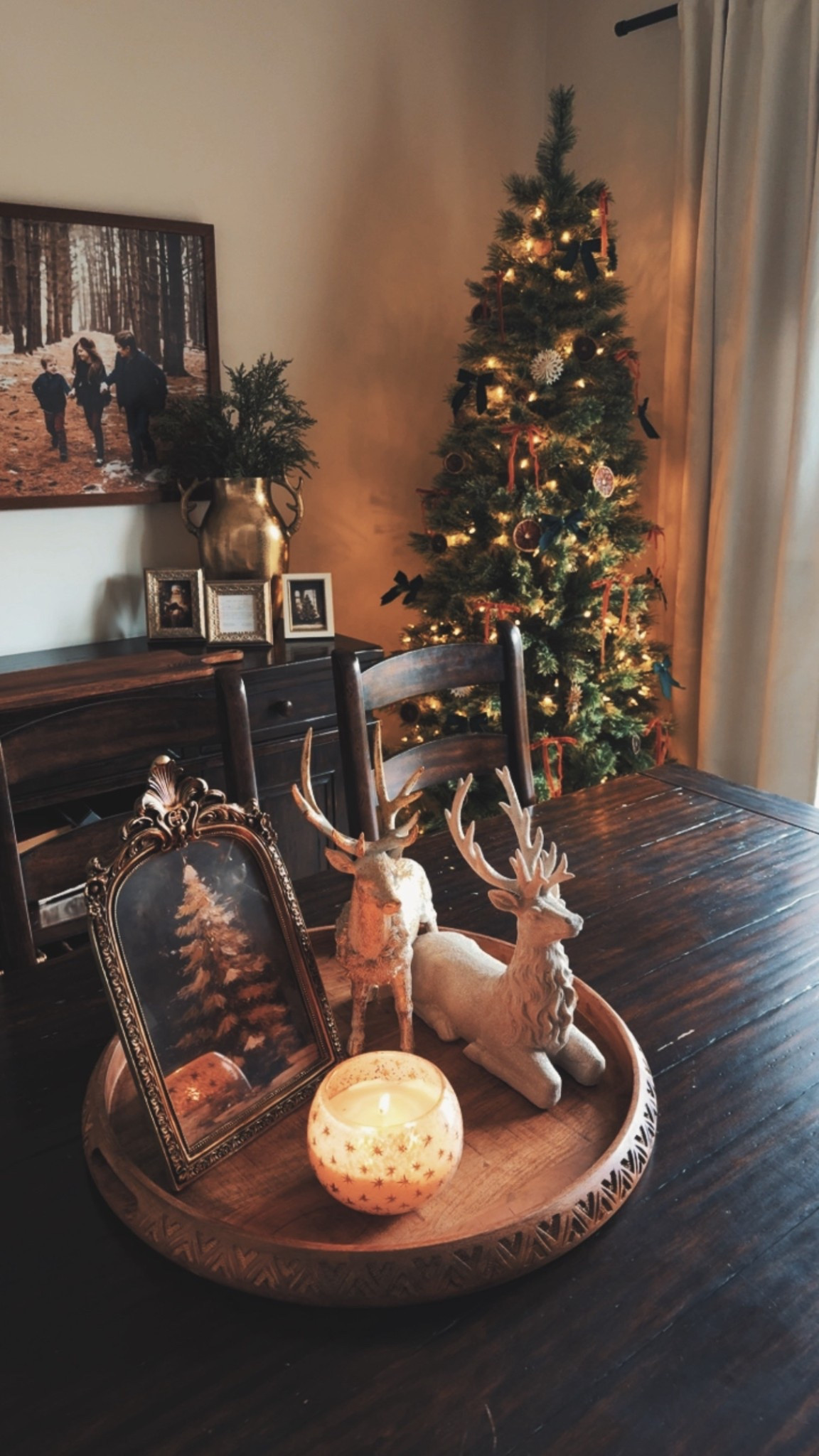 Going for a super cozy Christmas and I think I nailed it!!  Linked as much as I could!! 

Christmas tree, dried oranges, reindeer, wooden tray, Christmas photo, orange tree, gold decor.

#LTKSeasonal #LTKHoliday #LTKHome