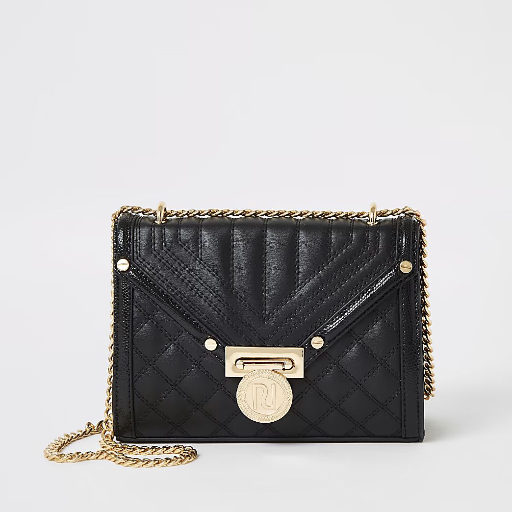 Black quilted mini cross body bag | River Island (UK & IE)