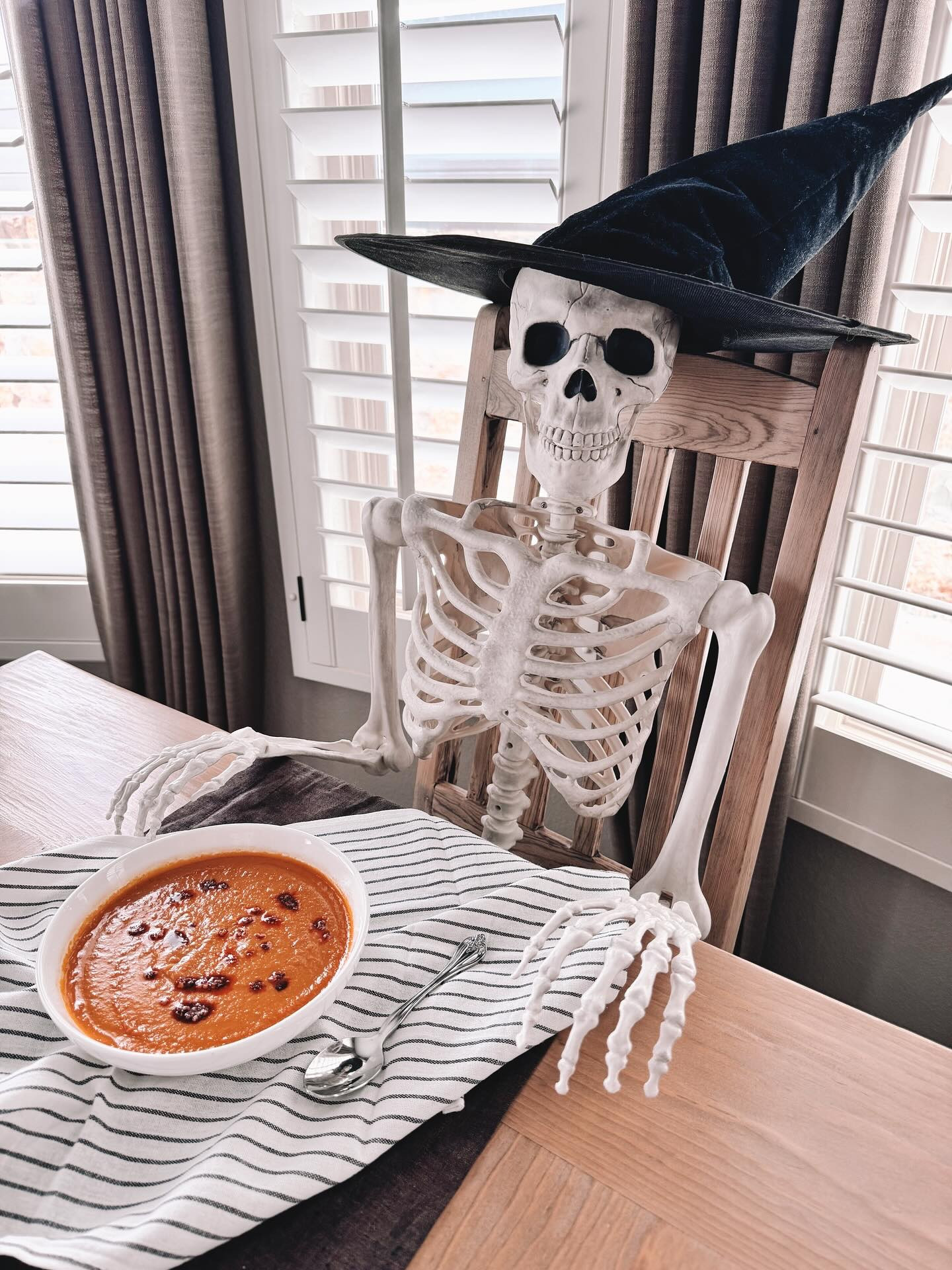 When the butternut squash soup is to die for!
It’s vegan and GF but has so many yummy flavors and the chili oil made it! I couldn’t get enough! Here’s the recipe

•1 small to medium-sized Butternut Squash •7 fl oz Coconut Milk •1 Red Onion •2 Carrots •1 Bell Pepper •2 heads of Garlic •1 cup of Cherry Tomatoes •1 1/2 cups Vegetable Broth •Olive Oil enough to drizzle over vegetables
Seasoning:
•1 tsp Black Pepper •1 tsp Ground Cumin •1 tsp Paprika •1 tsp Dried Thyme •1 tsp Dried Rosemary •1 tsp Chili Oil

Instructions:
Preheat the Oven: Set your oven to 390°F  Prepare the Vegetables: You can either peel and chop the butternut squash, or simply cut the squash in half for roasting. Season the Vegetables: Add the seasonings to the vegetables. Drizzle with olive oil and toss to coat evenly. If halving the squash, drizzle olive oil on the exposed flesh. Cover the dish with aluminum foil. Roasting: Roast for about 1 1/2 hours, or until the vegetables are golden and soft inside. If you’ve chopped the vegetables smaller, the roasting time can be reduced. If you’ve halved the butternut squash, expect a longer roasting time. For the last 10 minutes, remove the aluminum foil to allow the vegetables to caramelize slightly. Blending: Once roasted, scoop out the flesh of the butternut squash (if halved) and transfer all the vegetables to a blender.
Cooking the Soup: Pour the blended mixture into a pot and place it on medium heat. Stir in the coconut milk and cook for about 2 minutes, allowing everything to warm through.
Garnish with a drizzle of coconut milk, or chili oil  
#glutenfree #vegan #butternutsquashsoup #soupseason #foodie #goodfood #fallseason #fallmeals #halloweendecor #homemade