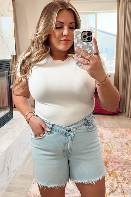 curvy spring denim shorts look! wearing size xl in fitted white cropped tee and size 32 in light wash mid length crossover denim shorts 

#LTKSeasonal #LTKcurves #LTKunder50