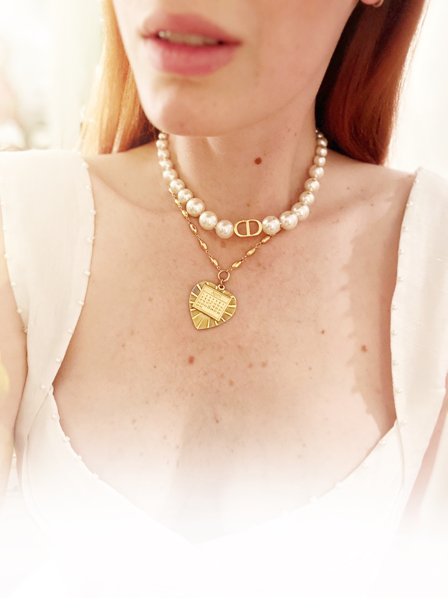 I got this calendar necklace at Christmas in anticipation of our 9th wedding anniversary. Next week is the big day and I’m loving it layered with my Dior Pearl choker. More pics of this look coming soon! 

#LTKGiftGuide #LTKwedding #LTKSeasonal