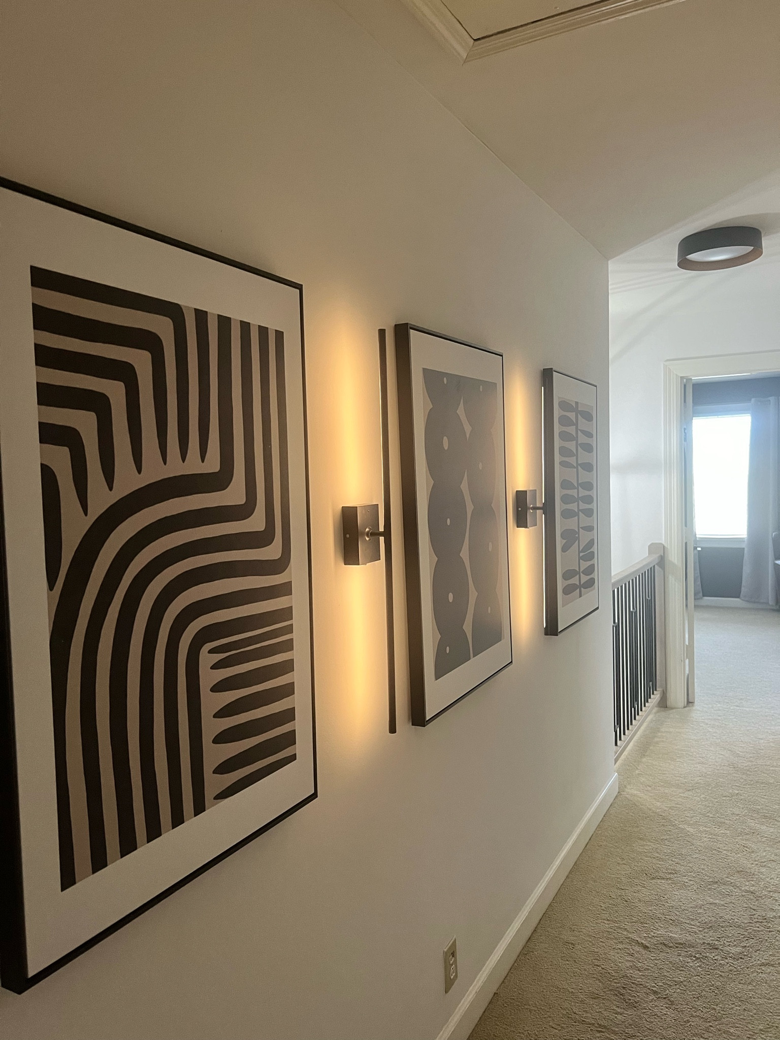 The new hallway is such a vibe. The wall sconces are battery powered and come with a remote which I love! All of this was so affordable!

#LTKHome #LTKFindsUnder50 #LTKFindsUnder100