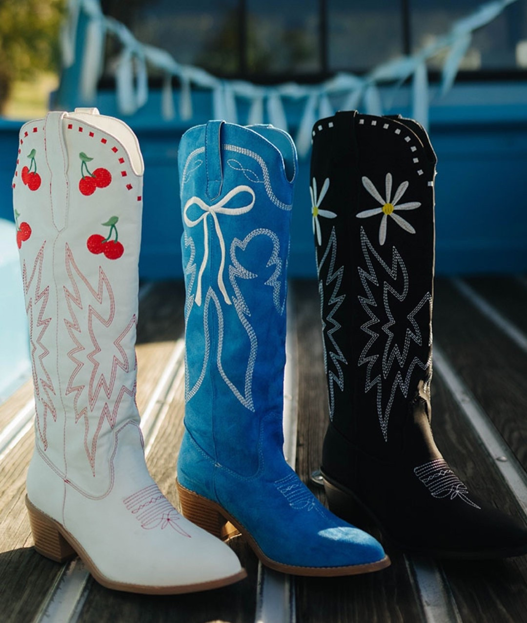 The cutest girly western boots! Cherries, bows and daisy cowboy boots. 

#LTKFestival #LTKFindsUnder100 #LTKShoeCrush