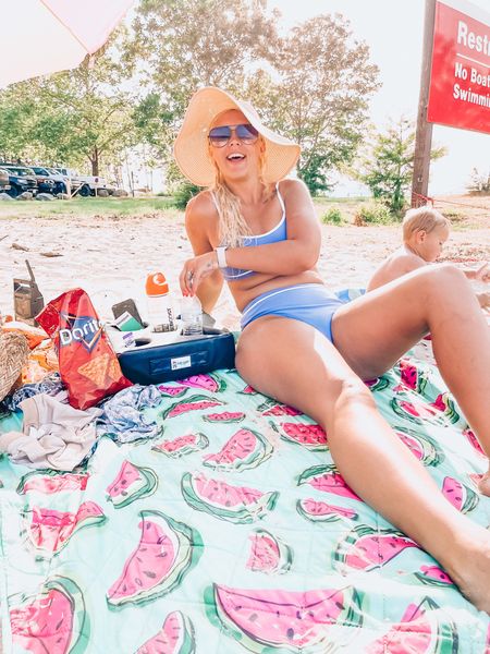 Mom life on the sandy lake shore 🤪

Suit is SHEIN - ordered a large because I wasn’t sure on sizing - fits perfectly (I usually wear mediums in everything) size up one! 

Hat is Target - $8! And it rolls up so it won’t get ruined in transit 

Sunnies are Quay - High Key

Drink holder is a cup cozy off of Amazon! Love this thing so much!

Watermelon blanket bag - Walmart from a few years ago! 

#LTKsalealert #LTKFind #LTKSeasonal