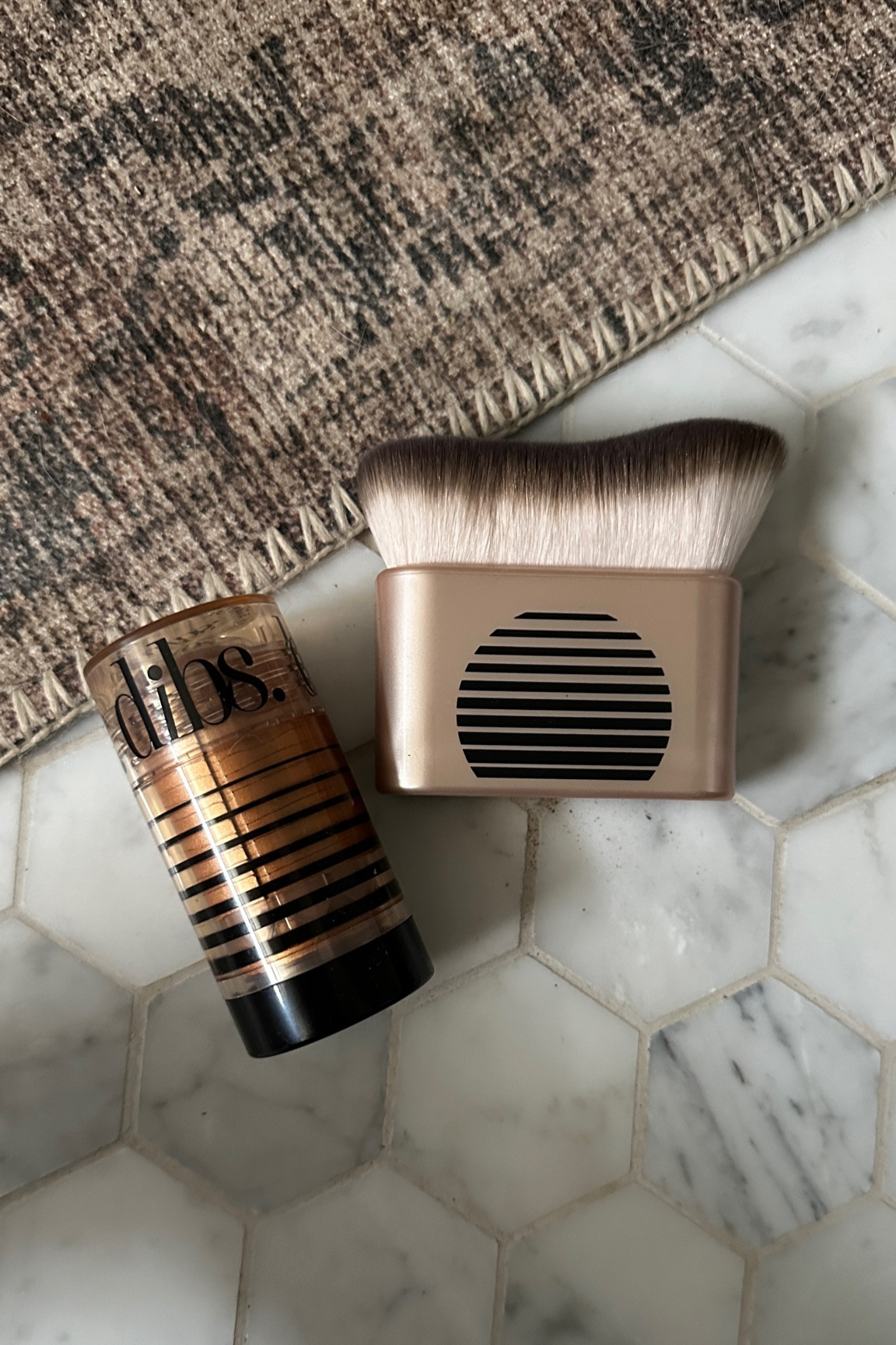 Dibs bronze status stick and brush. IM OBSESSED! Tap photos to shop and follow for more!  Xx 

#LTKbeauty #LTKstyletip #LTKitbag