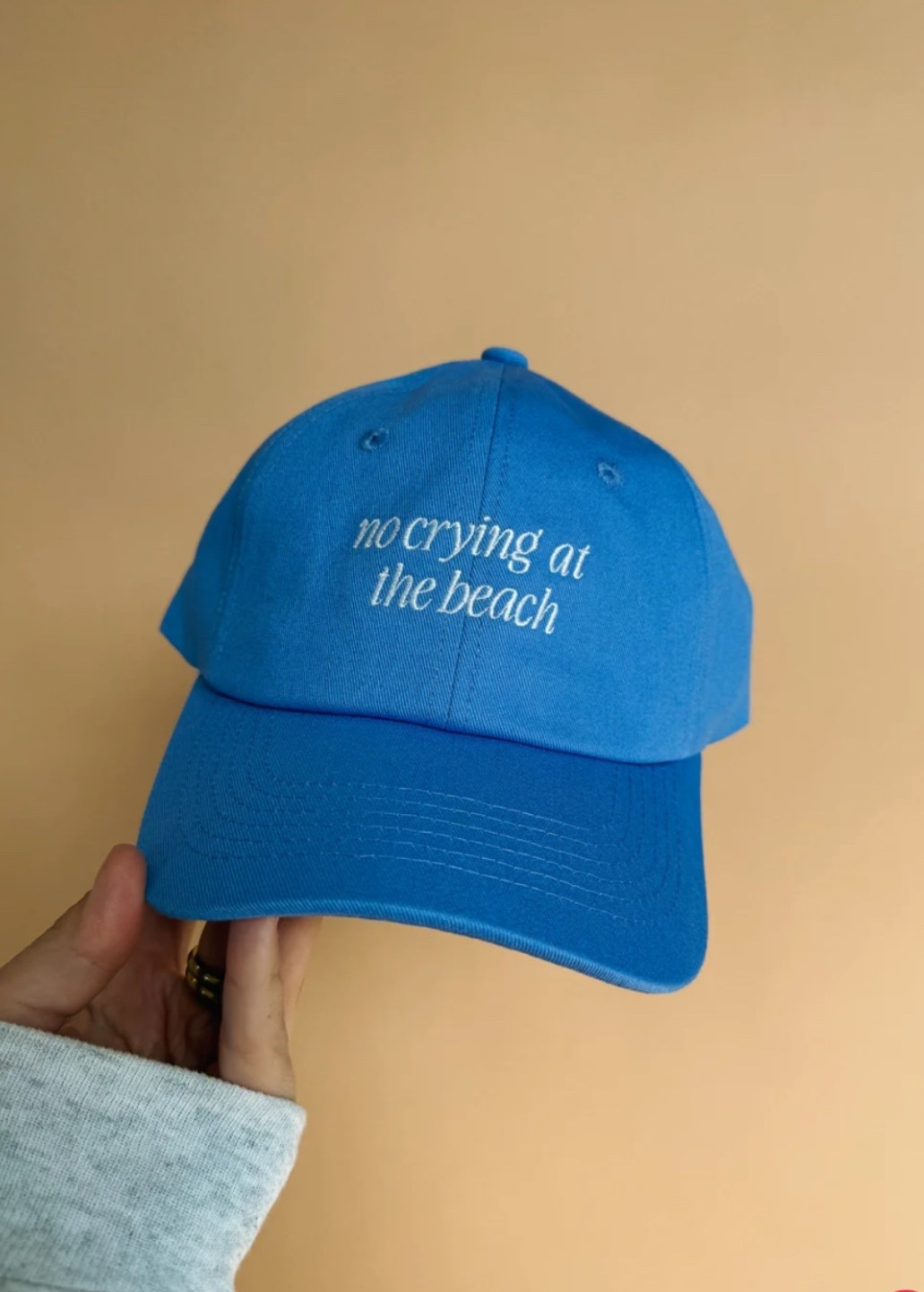 Beach days just got even better 🌊☀️ Obsessed with this ETTA OG “No Crying at the Beach” dad cap—cute, comfy, and perfect for throwing on with any summer outfit! Linking this must-have hat plus all my favorite beach essentials, from oversized totes and sandals to sunnies and coverups. 🏖️🐚

#LTKSummer #BeachStyle #EttaAndEast #BeachEssentials #SummerFavorites #LTKFinds #VacationStyle #BeachDayReady #CoastalStyle #SummerAccessories