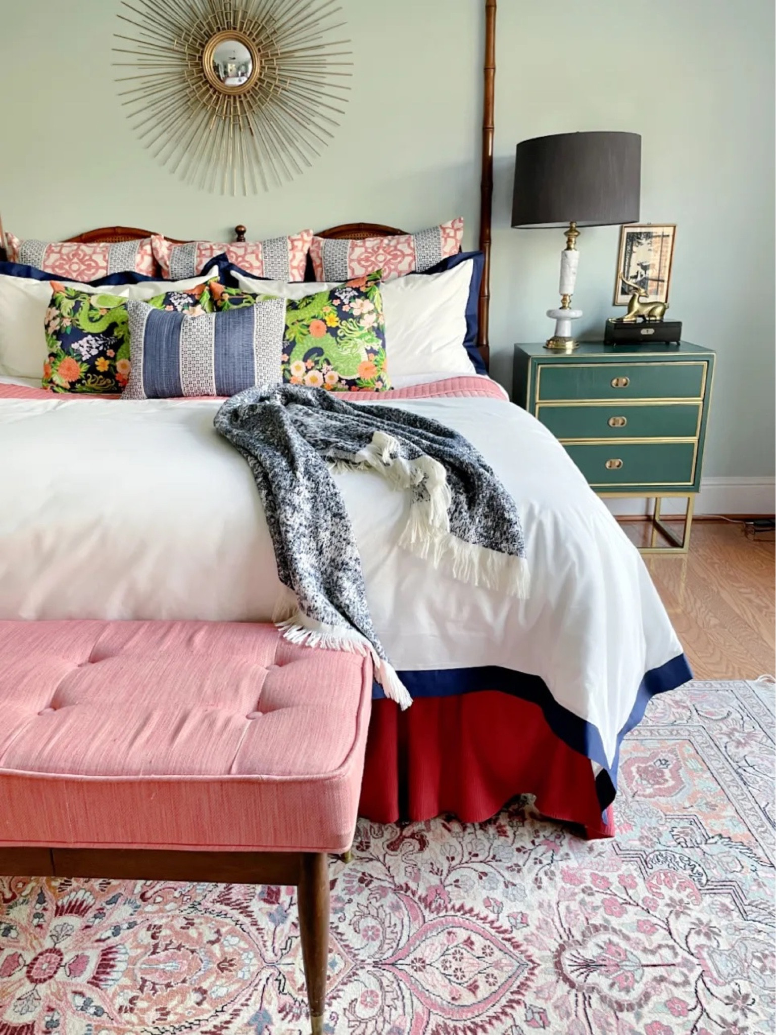 Master bedroom, king bed, green nightstand, navy bedding, coral bedding, coral bench, navy throw, bamboo bed, black lamp shade

#LTKhome