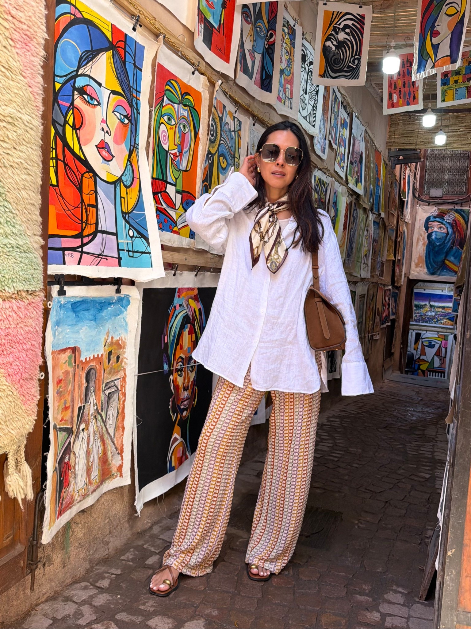 What I wore to the Souks. White linen shirt size Small and crochet trousers size small. 
Leo et Voilette suede bag. 
Gucci sunglasses 
mango scarf 
Zara sandals 

#LTKstyletip #LTKeurope #LTKtravel