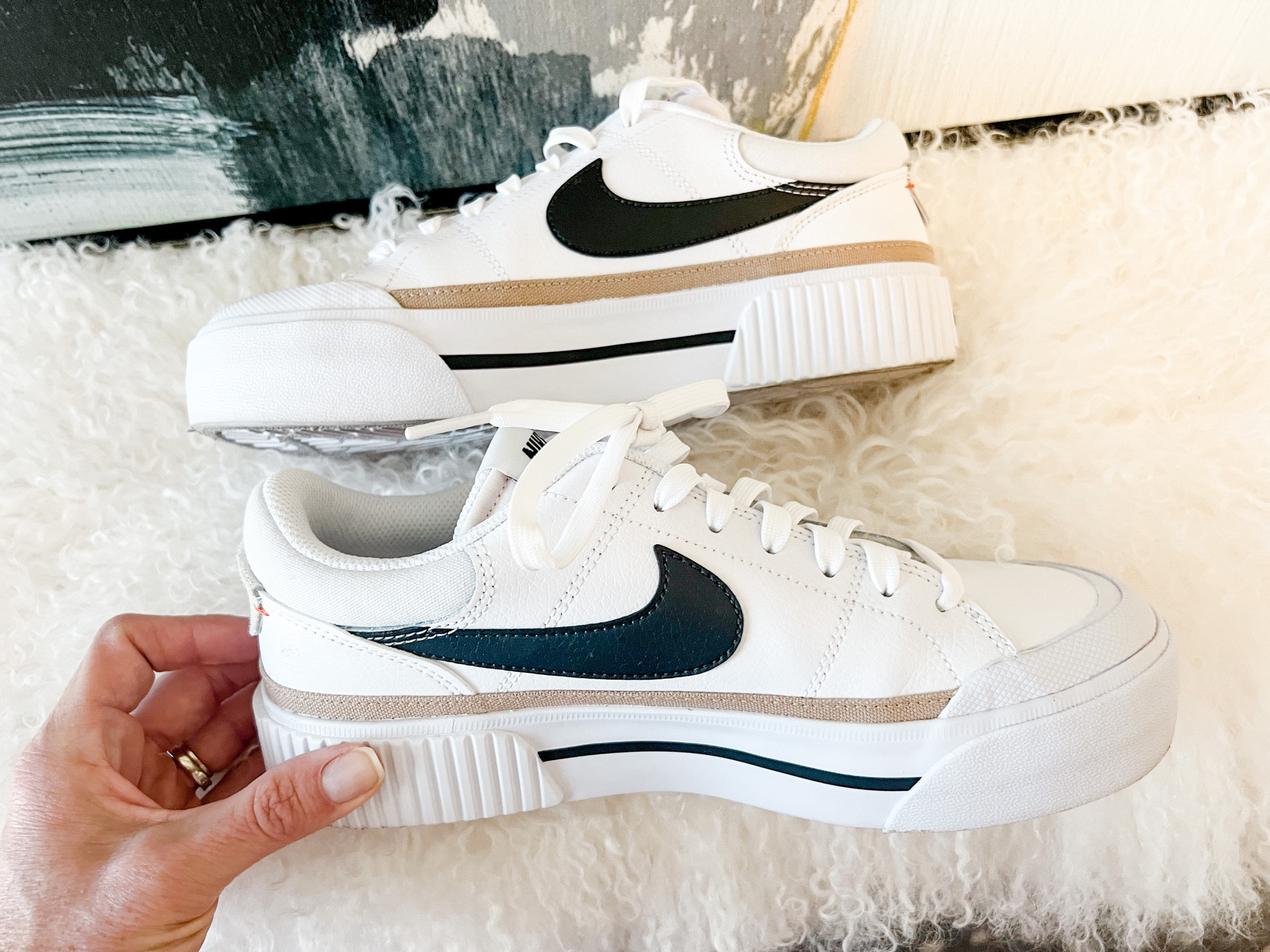 CUTEST sneaker with a lift! This Nike platform sneaker is back in a few sizes again. I have been waiting for these to come in my size & finally scored. They run tts and are very comfy! If you fall between sizes go down  

#LTKshoecrush #LTKunder100 #LTKstyletip