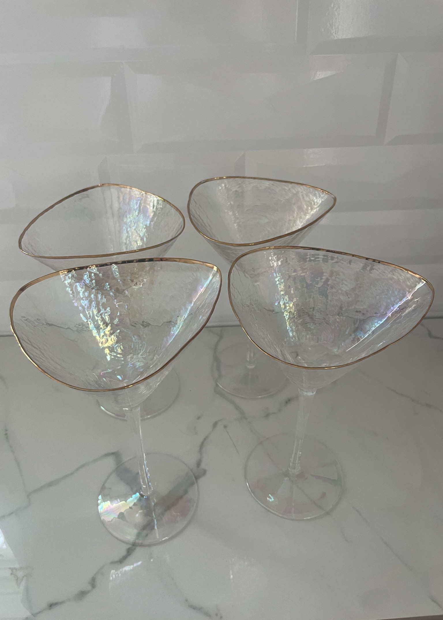 My favorite cocktail glasses! They have a unique irregular shape and a beautiful iridescent finish! 

Cocktail glass, martini glass, bar cart accessories, kitchen, glassware, drink ware, house warming gift, wedding gift

#LTKunder100 #LTKstyletip #LTKhome