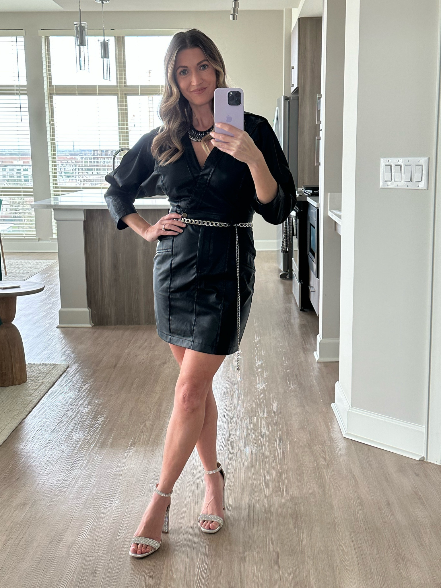 Black vegan leather dress with chain belt and sparkly heels

#LTKworkwear #LTKfit #LTKstyletip