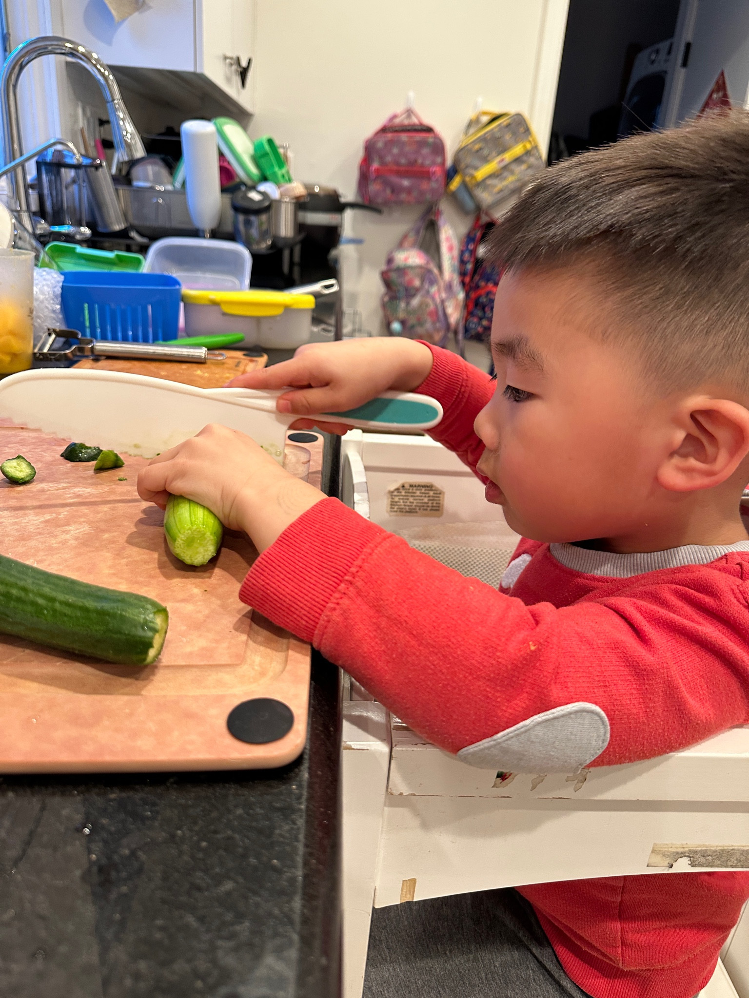 Chopping up some cukes!

#LTKFamily #LTKKids