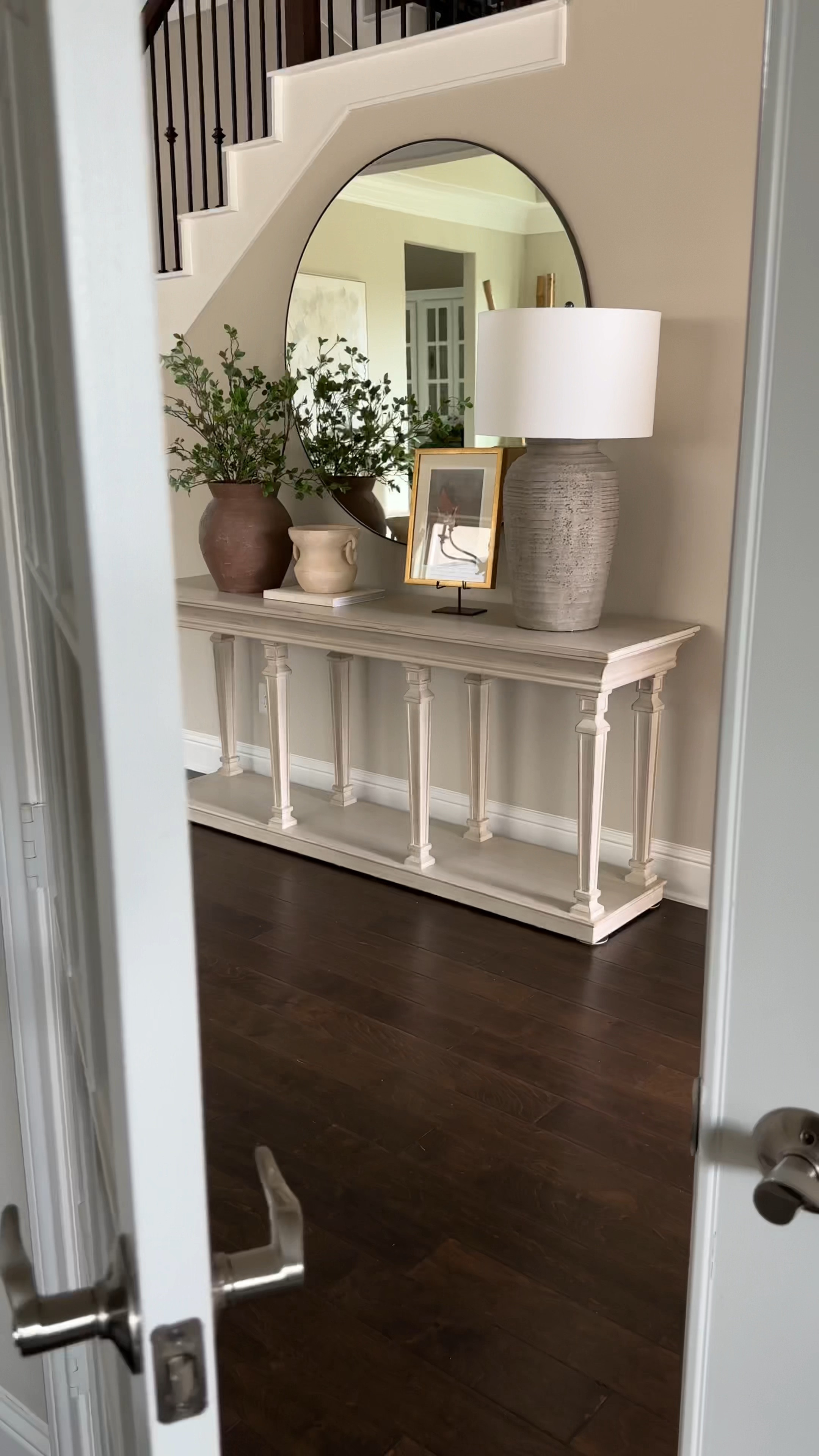 Welcome to my series where’s it from!! Let’s take a look into my entryway. My table has been discontinued so I linked a similar one, my lamp is pottery barn, and the 2 vases are McGee and Co, and my easel is also McGee and Co and art is Target. And my oversized mirror is CB2. 

#LTKstyletip #LTKhome #LTKFind