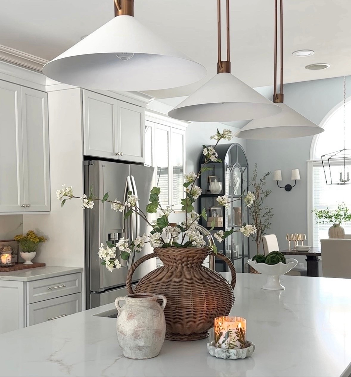 Happy Easter weekend! Spring styling, favorite woven, rattan and neutral vases, spring candle, pendants, florals, glass cabinet, sconce, dining room furniture and more spring home decor accessories! Target, McGee & Co, Pottery Barn. 

#LTKdayinmylife #LTKHome #LTKSaleAlert