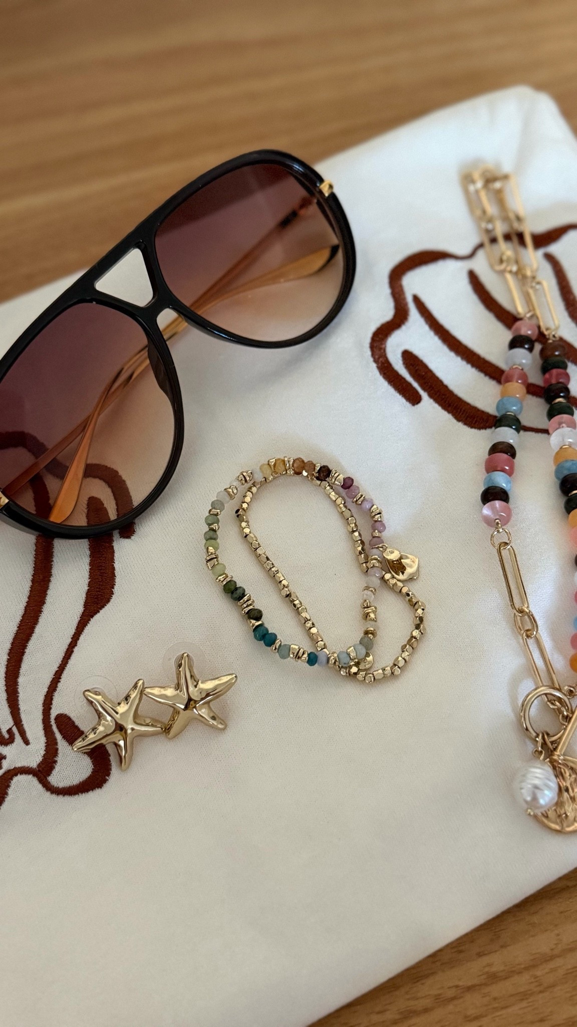 Sea shells is the theme. I've linked the shirt and accessories for summer.

#LTKOver40 #LTKSeasonal #LTKootd
