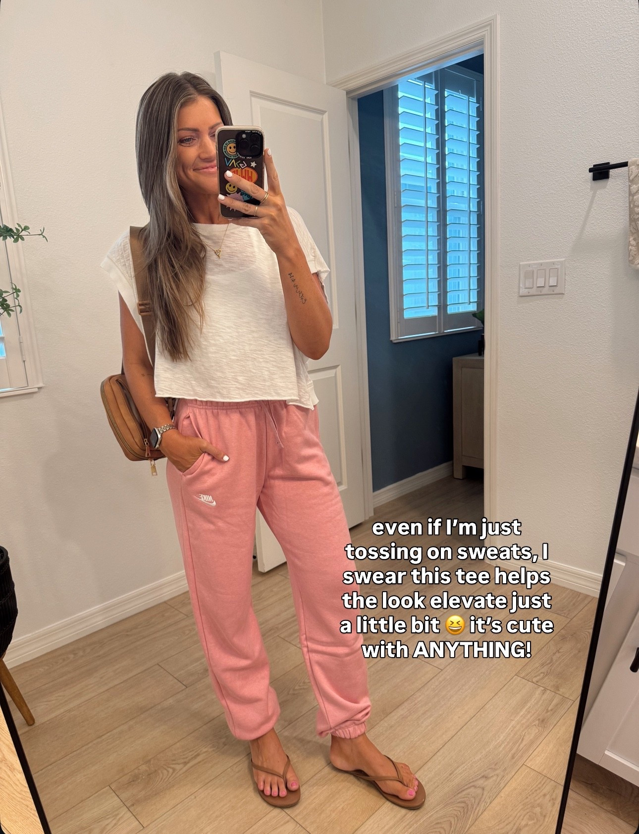 I have this tee in both small and XS and prefer XS! XS sweats. Size down 