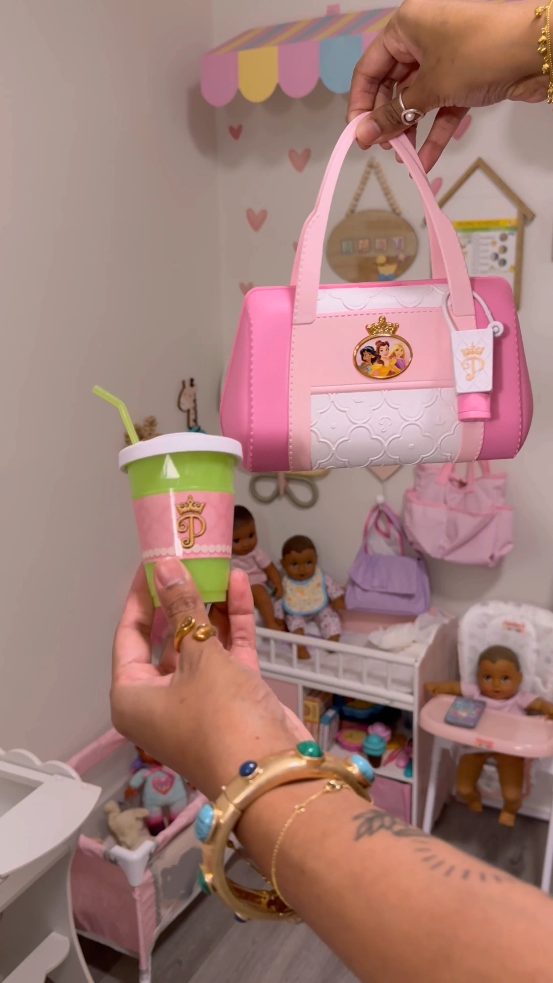 A tote bag with all the essentials and it’s princess themed! 

Adding this to our baby nursery so our mommy bag has even more essentials! 

Details on this cute tote bag : 

STYLISH TOTE BAG DESIGN: On-The-Go Trendy Tote is a stylish and functional carryall bag for a life on the go! 

WATCH W/ INTERCHANGEABLE SCREEN: Pretend to track your steps & monitor your health just like mom with the play step counter watch. Multiple “screens” move so you can that you can tell the time, check your “heart rate” & more! 

HEAD OUT IN STYLE: Run errands, go shopping, or just head out in style!  Make sure to bring your play sunglasses!
PLAY GREEN JUICE: After running around, pretend to “drink” your play juice to stay refreshed!

ESSENTIALS FIT IN TOTE: All your trendy essentials fit into your bag!

INCLUDES 10+ PRETEND PLAY PIECES: 1 Tote Bag, 1 Pair of Play Sunglasses, 1 “Step Counter”, 1 Green Juice Cup W/ Lid & Straw, 1 Protein Bar, 1 Hand Sanitizer, 1 Lip balm & Cap, 1 Gym Membership Card, 1 Credit Card

#pretendplay #playtimefun #toys #playland #playingislearning #pretendplaytoys #toyreview #playbaselearning #princesstoy #disneyfamily #disneypartner