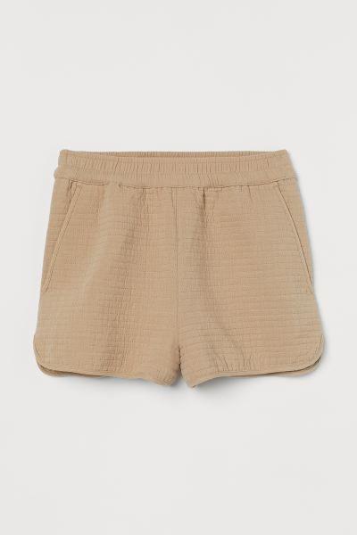 Short shorts in a cotton weave with quilted seams and trims in the same colour. High waist with c... | H&M (UK, MY, IN, SG, PH, TW, HK)