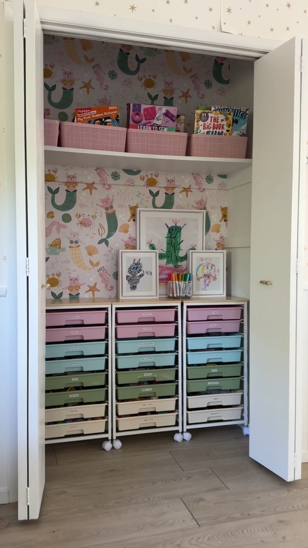 A fun closet makeover for my five year old daughter! The rolling drawers are perfect for storing art supplies and small toys. And of course that wallpaper steals the show! 

#LTKKids #LTKHome #LTKFamily