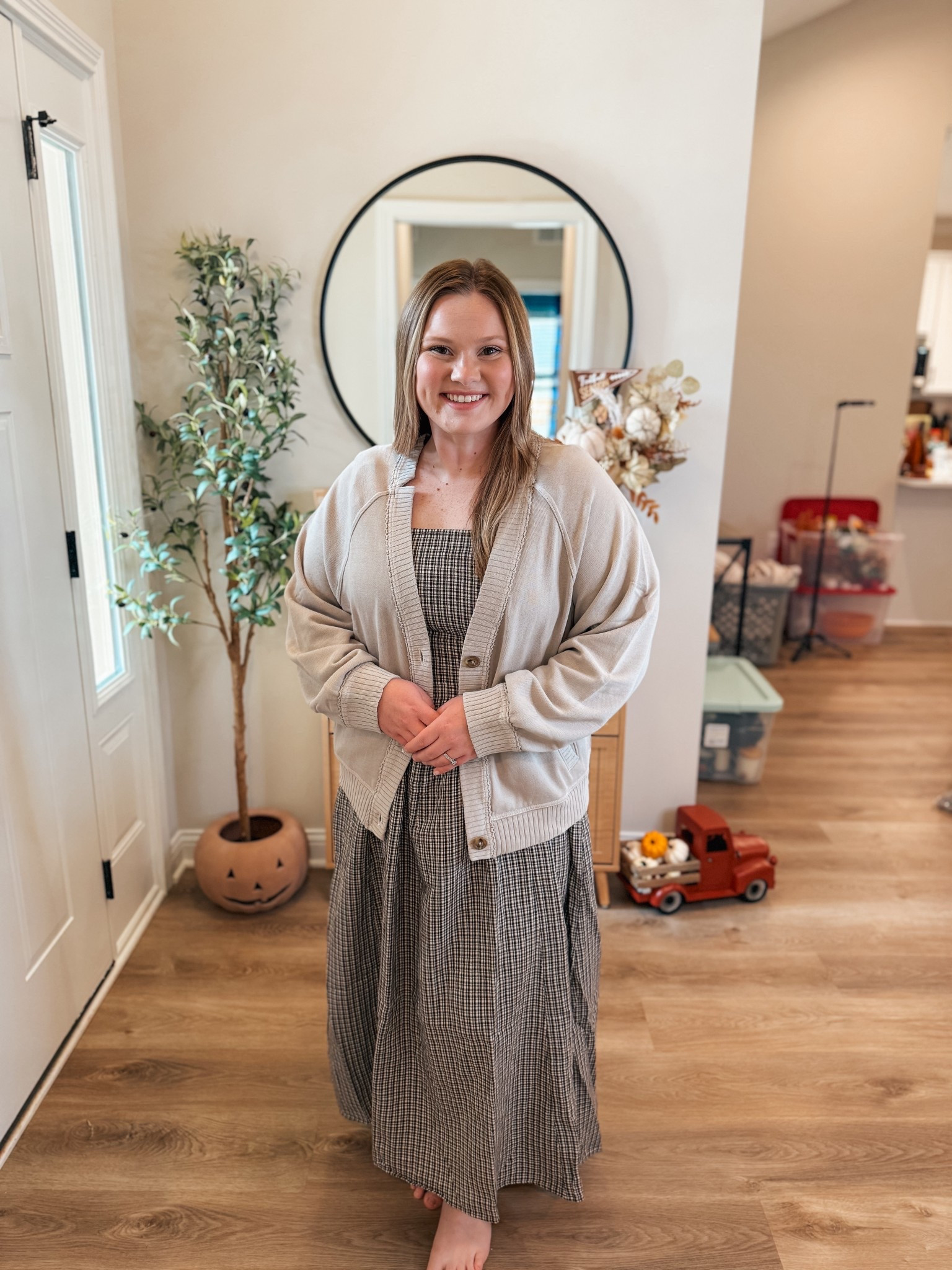 Fall dress and cardigan form Aerie perfect for fall family pictures 

#LTKMidsize #LTKSeasonal #LTKSaleAlert