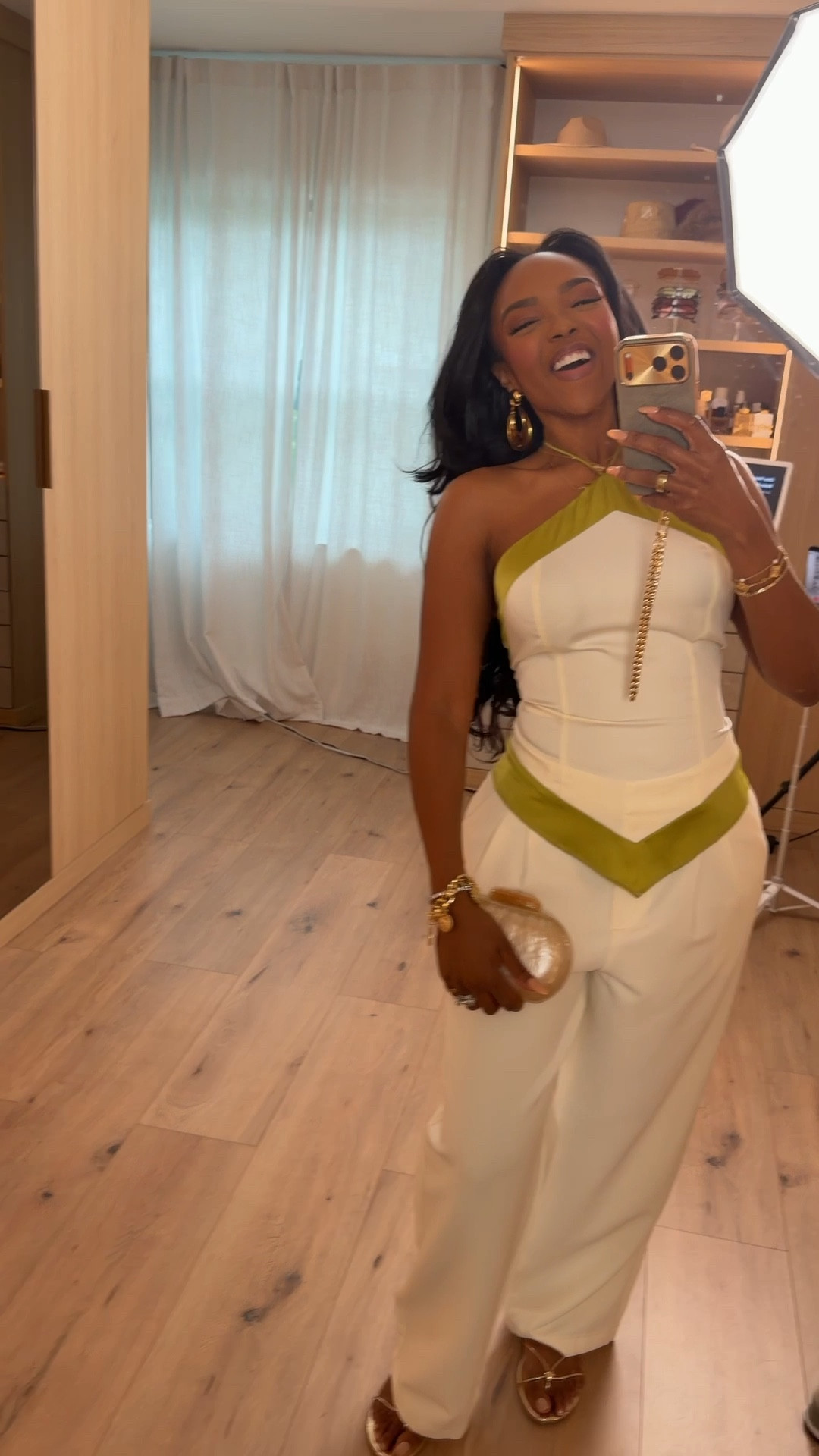 Scroll to shop this elevated neutral outfit featuring a structured white halter-style top with olive contrast detailing paired with relaxed wide-leg trousers for a polished statement look. The structured silhouette and bold contrast trim make this outfit feel modern while still timeless and elegant.

Perfect for dinner dates, summer events, vacations, or an elevated night-out look.

5'4" | 138 lbs | 34D bust | 27" waist | 40" hips

#LTKootd #LTKvlog #LTKSpringSale