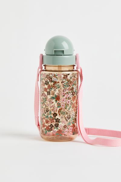 New ArrivalPlastic water bottle with an adjustable strap, straw, and non-drip cap. 15 1/4 fl. oz.... | H&M (US + CA)