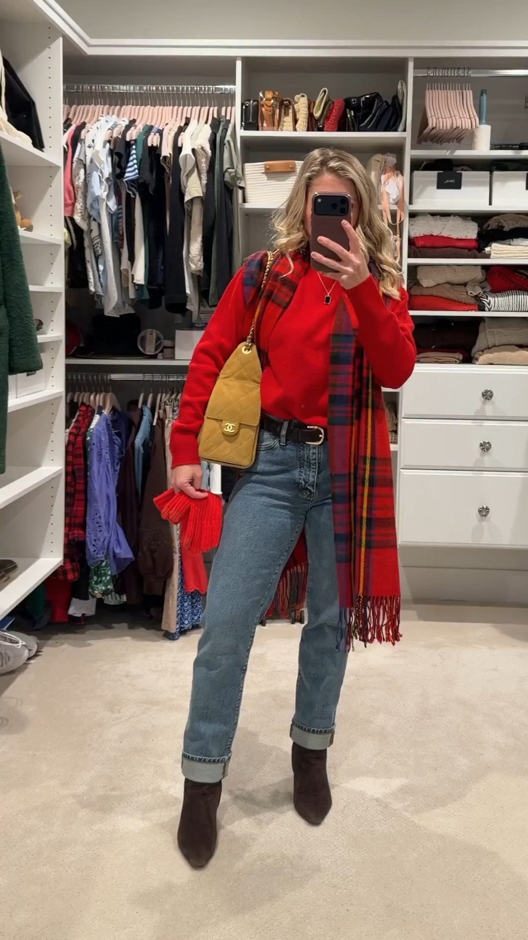 A cozy winter outfit with a little color. I layered a bright red sweater with relaxed denim, ankle boots, and finished it off with a plaid scarf and quilted shoulder bag for warmth and texture. Easy, comfortable, and perfect for winter days when you still want your outfit to feel fun and pulled together.

#LTKSeasonal #LTKHoliday #LTKootd