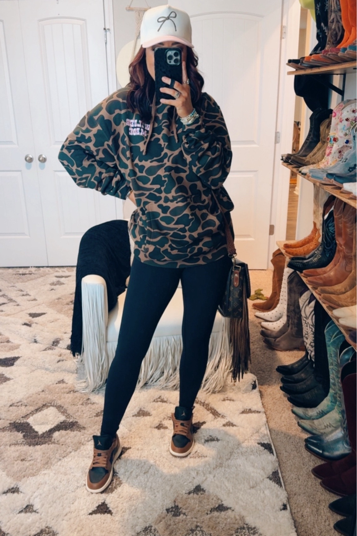 Duck camo hoodie - camo sweatshirt  - look for less Amazon leggings - Ugg boots - snow boots - booties - hat - trucker hat - travel outfit - western outfit - winter outfit - casual outfit idea - how to style black leggings wearing a medium in the sweatshirt and leggings 

#LTKSeasonal #LTKFindsUnder50 #LTKStyleTip