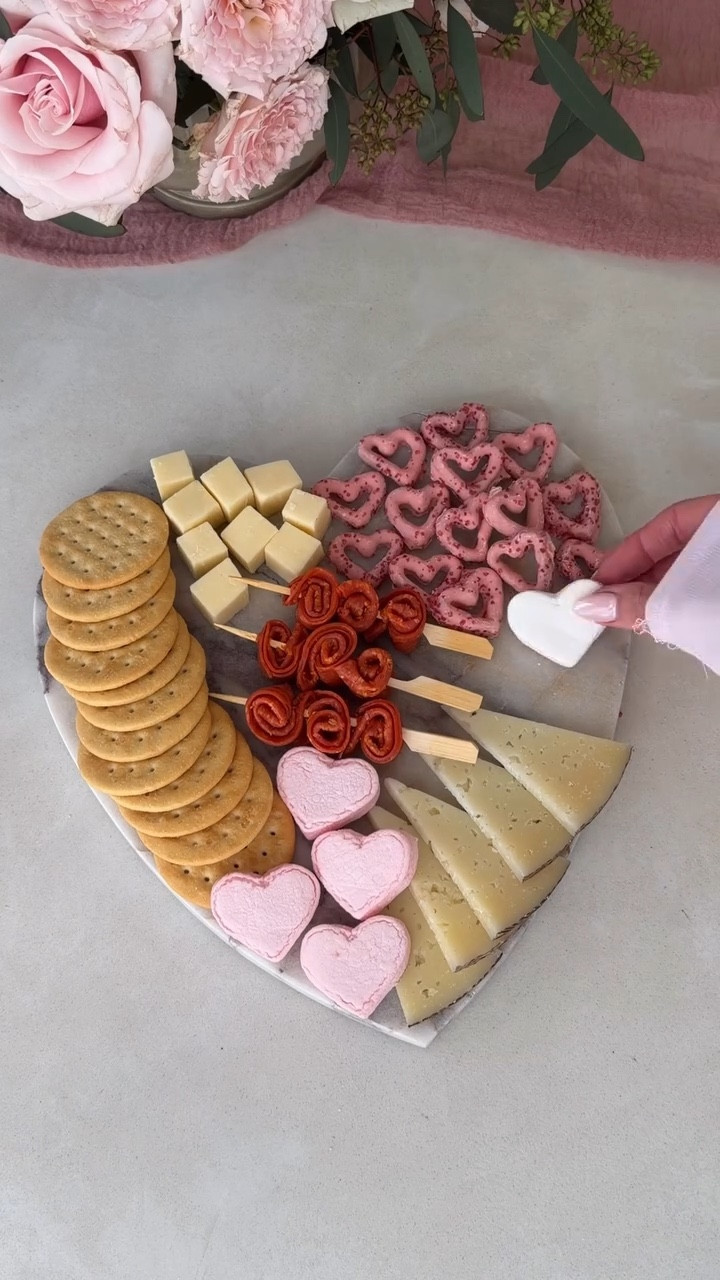 Which one are you - the board friend or the wine friend? Tag the person this immediately reminded you of! 

Comment “shop” + FOLLOW me for links to this heart-shaped charcuterie board and Valentine’s Day tablescape decor 💌

Perfect for Galentine’s, hosting the girls, or a cozy Valentine’s date night at home! 

#galentinesparty #valentinesdaycharcuterie #valentineshosting #tablescapeideas #girlsnightin