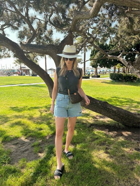 Tee cutoff denim shorts sunglasses straw fedora hat rubber slide sandals San Diego vacation outfit 

#LTKSeasonal #LTKstyletip #LTKFestival