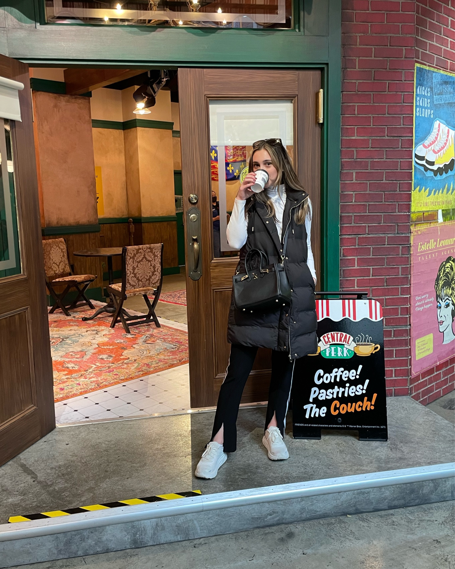 Casual NYC outfit
..
Track pants, Black vest, white turtleneck bodysuit, belt bag

#LTKtravel