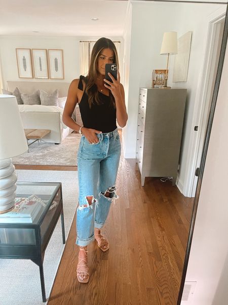 Summer outfit inspo - casual outfit ideas - black tank - ripped jeans - vacation outfit ideas - styling tips - summer outfits 

#LTKFind #LTKSeasonal #LTKstyletip